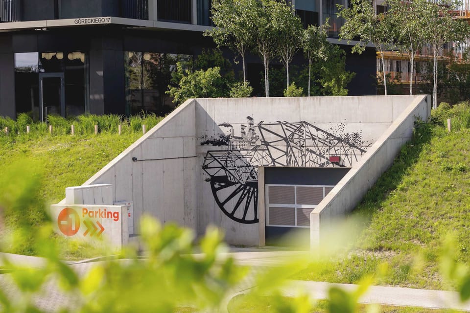 The entrance to the underground garage ensures convenient and secure parking.