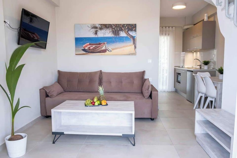 Bright and welcoming living area with comfortable seating and natural light.