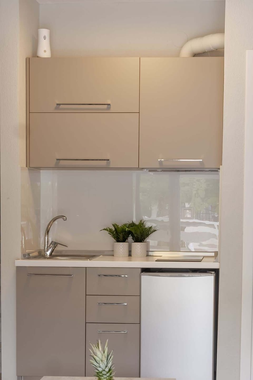 Fully equipped contemporary kitchenette for easy home cooking