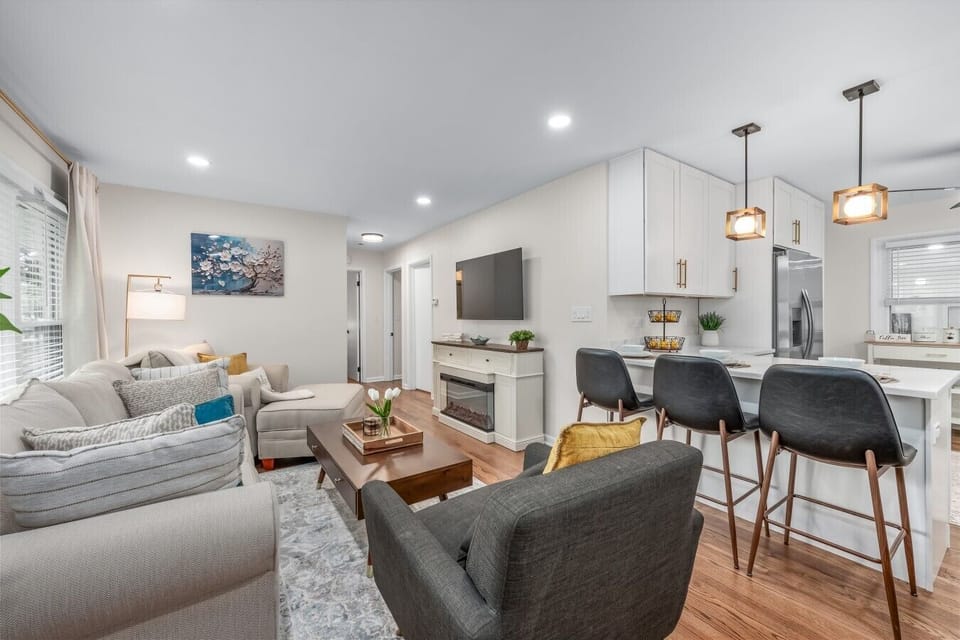 Lounge seating and island stools keep downtime within reach.