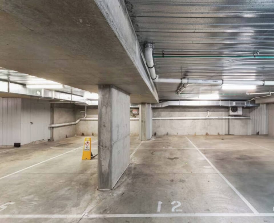 Secure undercover parking for 2 cars (tandem parking)