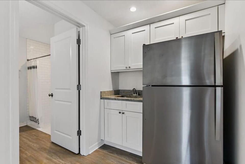 First floor bedroom, bath, and small kitchen.   Enjoy some private time before heading upstairs to join everyone else.