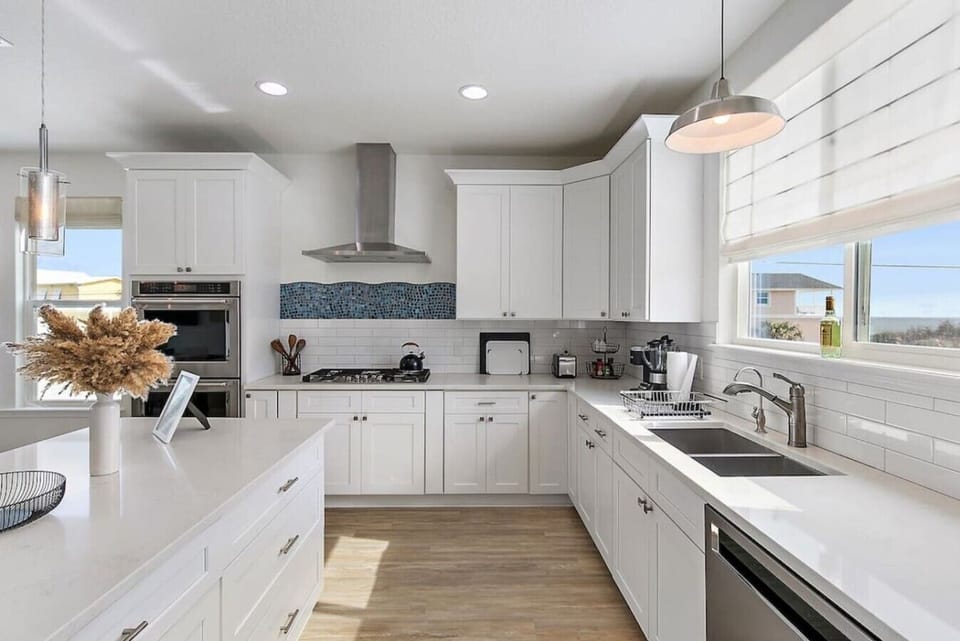 Spacious and pristine chef`s kitchen featuring a gas stove, a rarity in NE Florida.