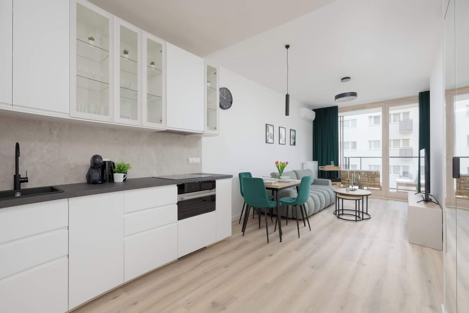 The kitchenette is designed to be practical and use space efficiently.