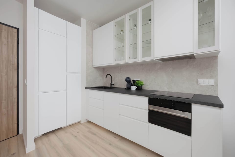 The fully equipped kitchenette includes everything you need for a home-cooked meal.