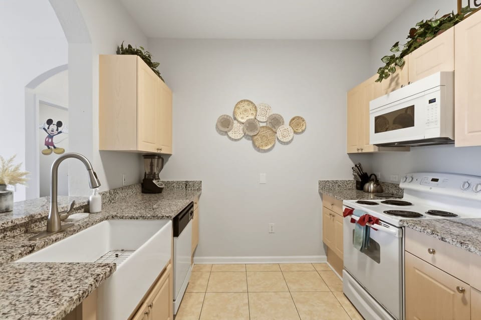 Fully equipped kitchen with everything needed for meals, snacks, and coffee breaks