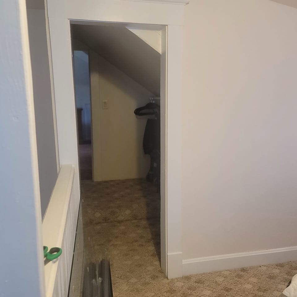 Hallway and closet to second bedroom