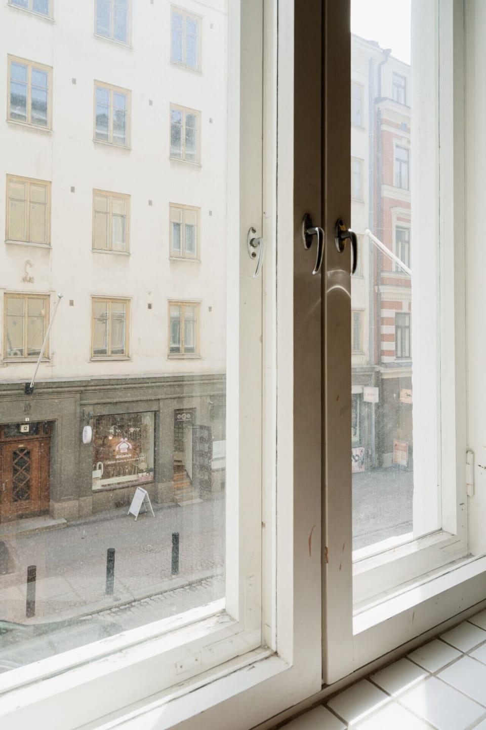 Natural light floods the apartment, creating a warm and inviting atmosphere for your stay in one of Helsinki`s most central neighborhoods.