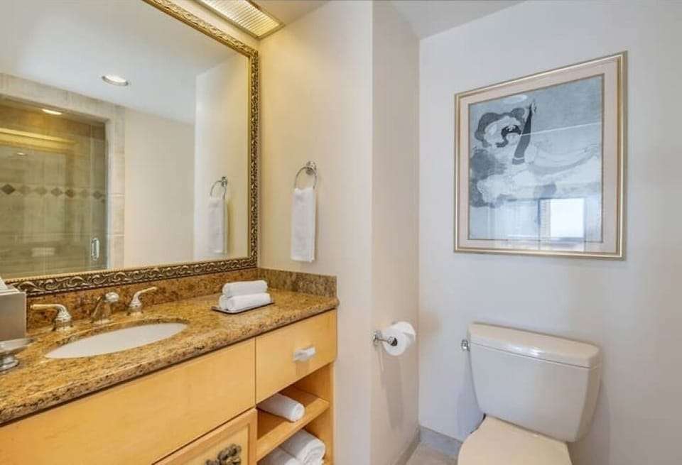Refresh easily with a spacious vanity and plush towels ready.