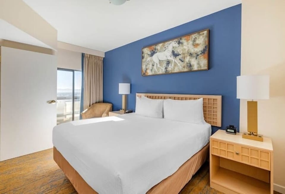 Relax in a sunlit bedroom with inviting, hotel-soft linens.