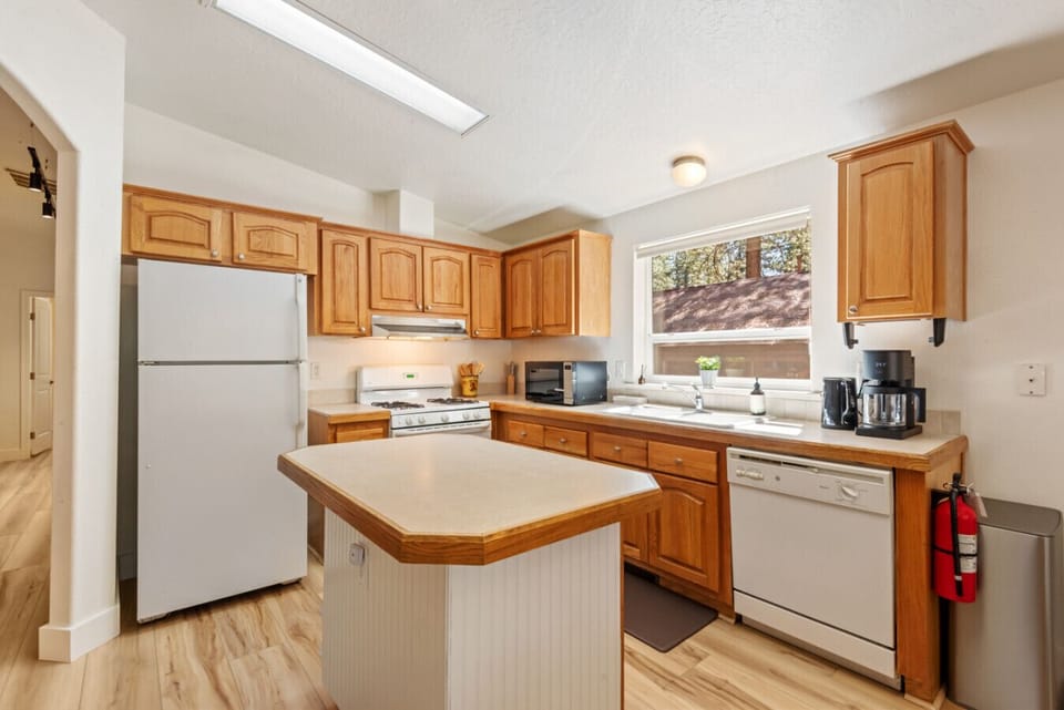 Modern Appliances Meet Warm Cabin Charm