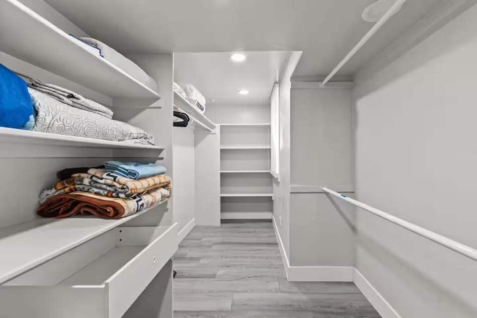 Spacious walk-in closet with extra linens.”
