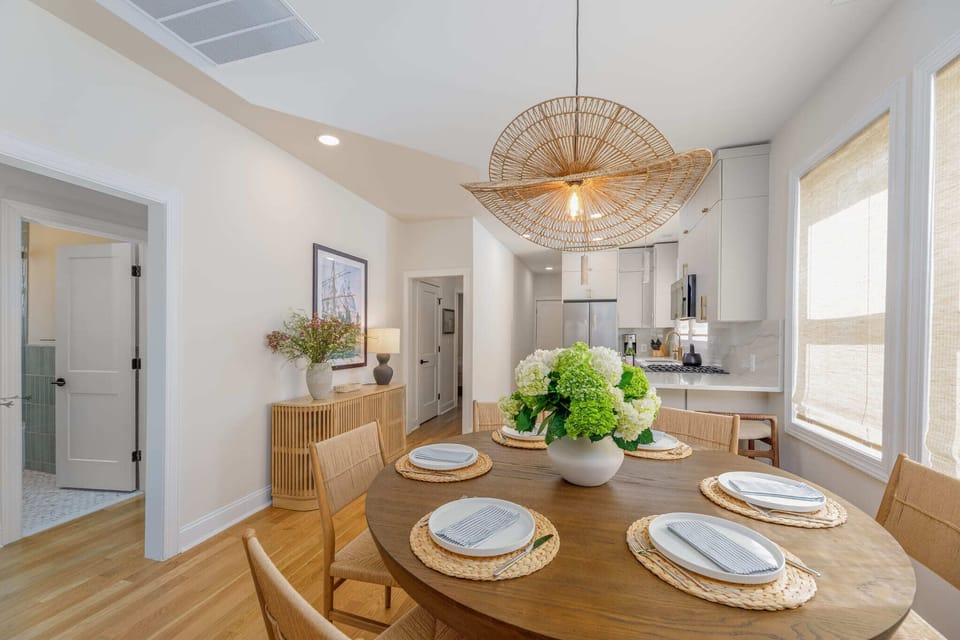 Gather everyone for dinner! Our designer dining table easily seats 6 guests, and we have room for 3 more at the kitchen peninsula.