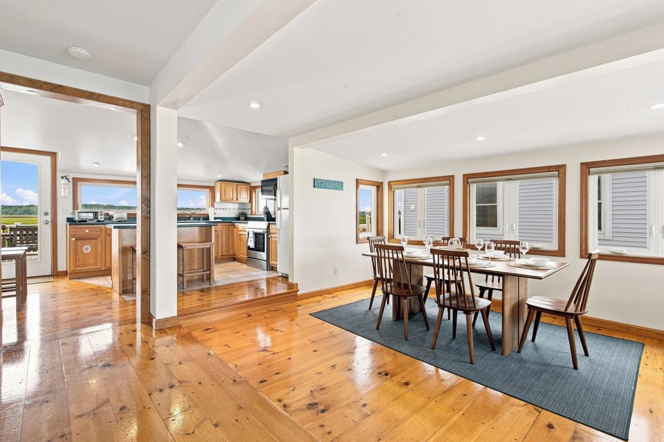 Spacious living and dining area designed for gathering with family and friends.