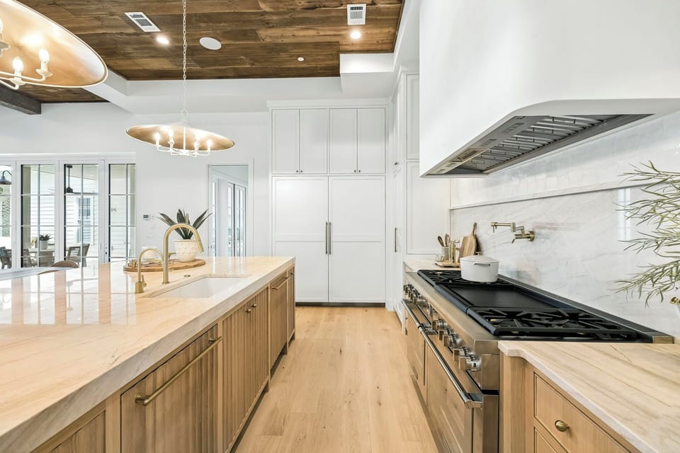 Luxurious Open Concept Chef's Kitchen with Barstool Seating for 5
