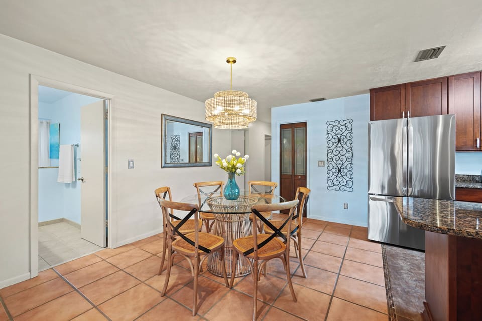 Bright and stylish dining area with modern finishes and seating for family meals and gatherings.