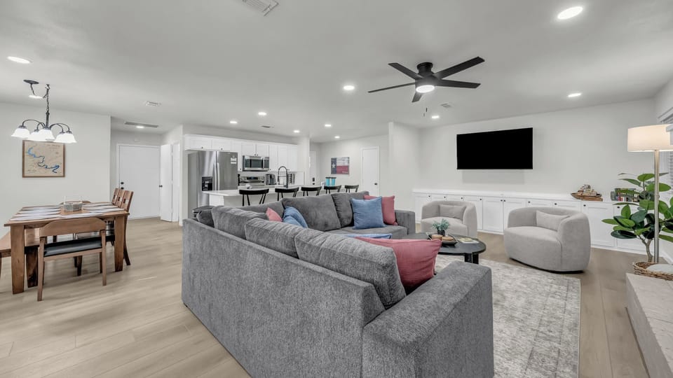 Open living spaces with room everyone. Chairs swivel to face the tv or inward