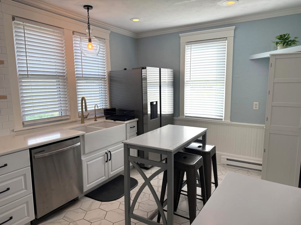     Bright modern kitchen with breakfast island