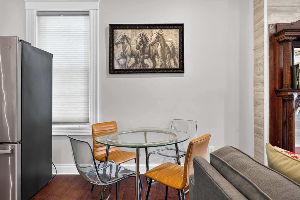 Dining Area: Gather around this cozy dining area, perfect for sharing home-cooked meals, enjoying morning coffee, or spending quality time with family and friends.