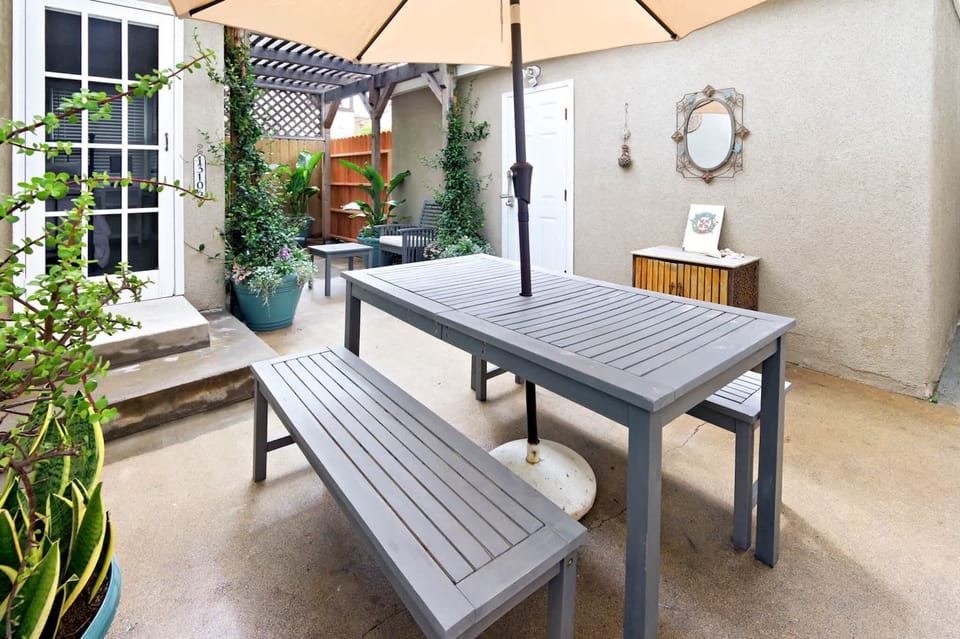 A backyard retreat with a cozy covered patio