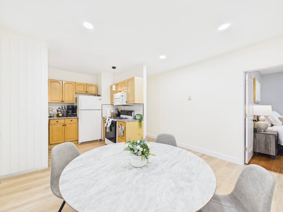 Bright dining space with full kitchen and easy bedroom access