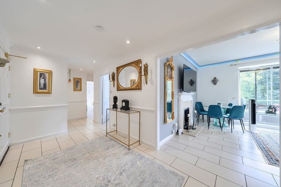 Welcoming hallway leading through to the bright dining space.