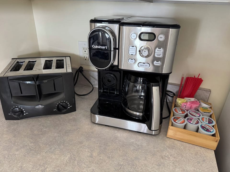 K-cup and brewed coffee machine. Starter k-cups provided. 
