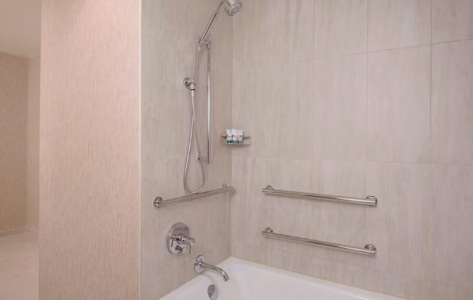 Rinse off in an accessible shower-tub with sturdy grab bars.