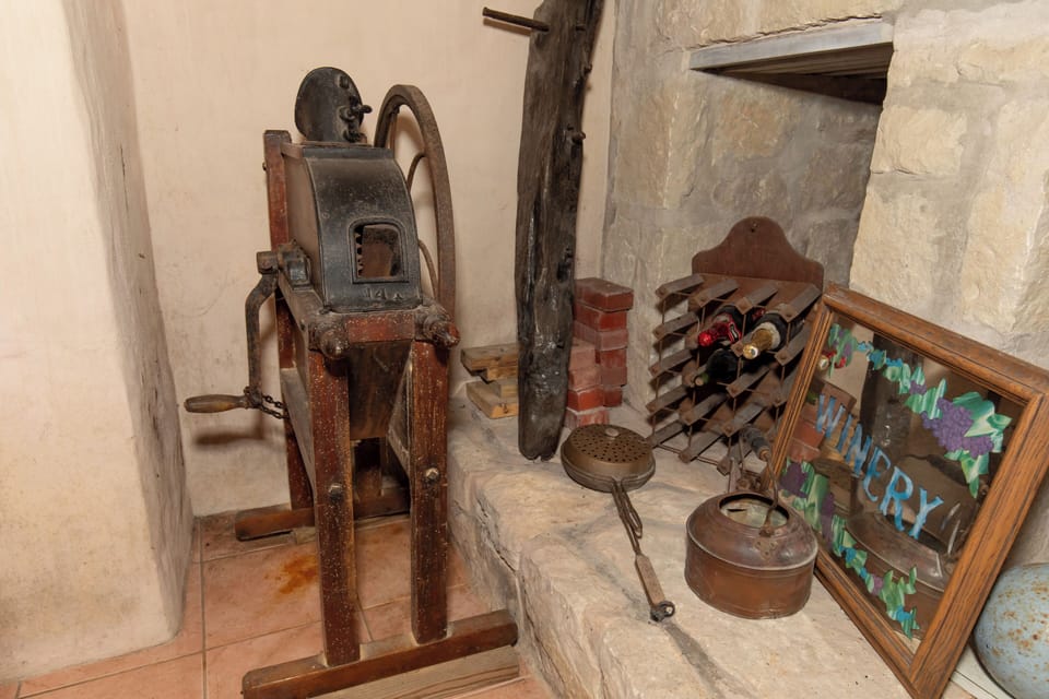 Step into a charming corner of history showcasing authentic winery artifacts and rustic stone accents that bring timeless character to your stay.