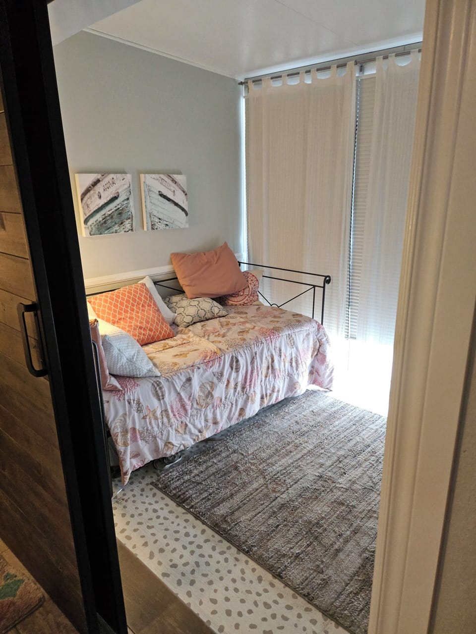Barn door seperates the guestroom from the 3rd bedroom.