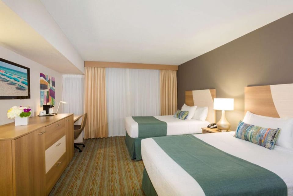 Rest easy in a spacious two-bed room for friends.