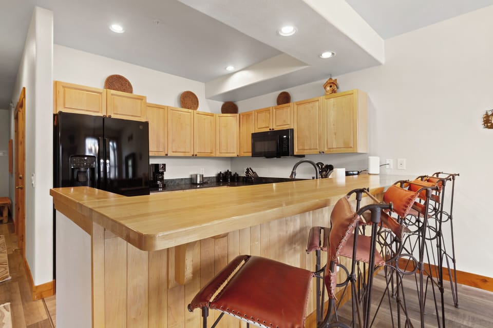 Large breakfast bar keeps everyone connected during meals and coffee.