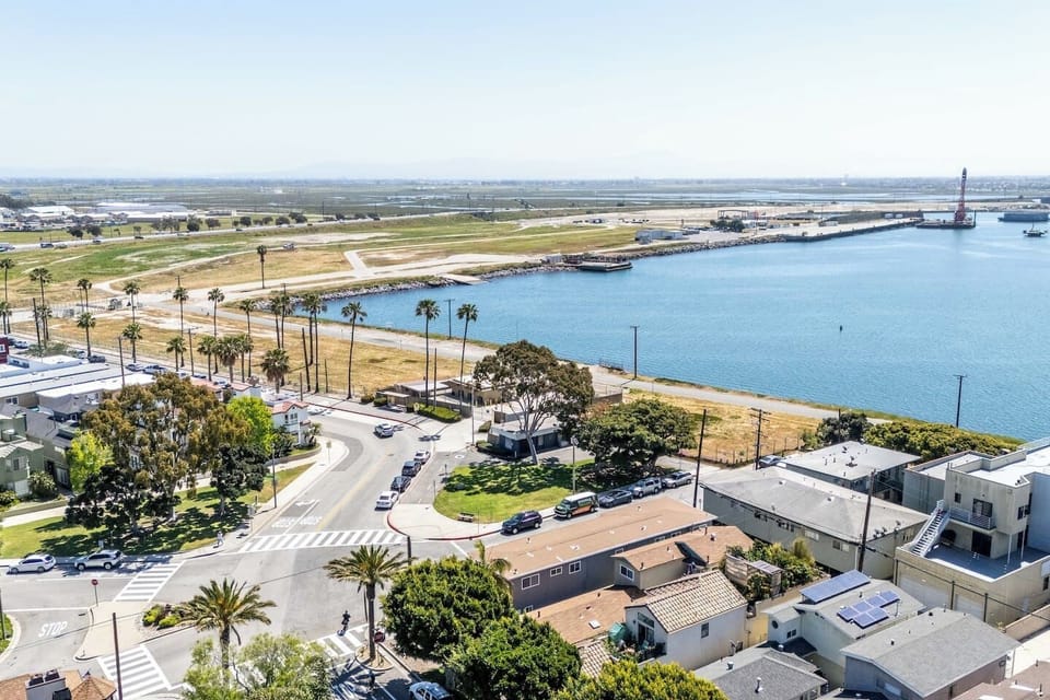 Aerial view of the beach, pier and marina