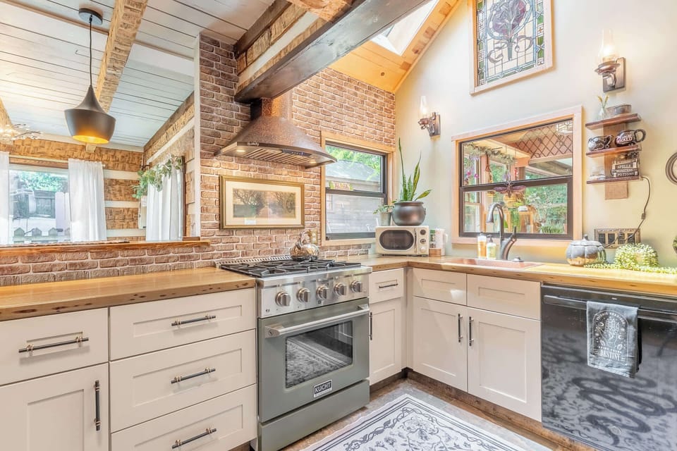 A stylish kitchen with custom countertops and stainless appliances