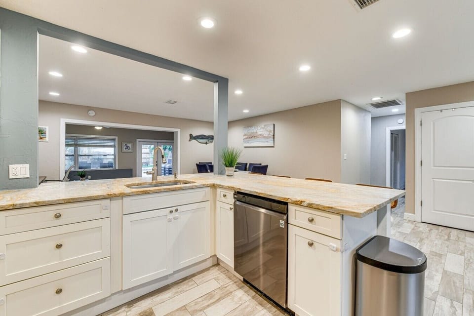 Kitchen | Granite Countertops & Dishwasher | Breakfast Bar & Recessed Lighting