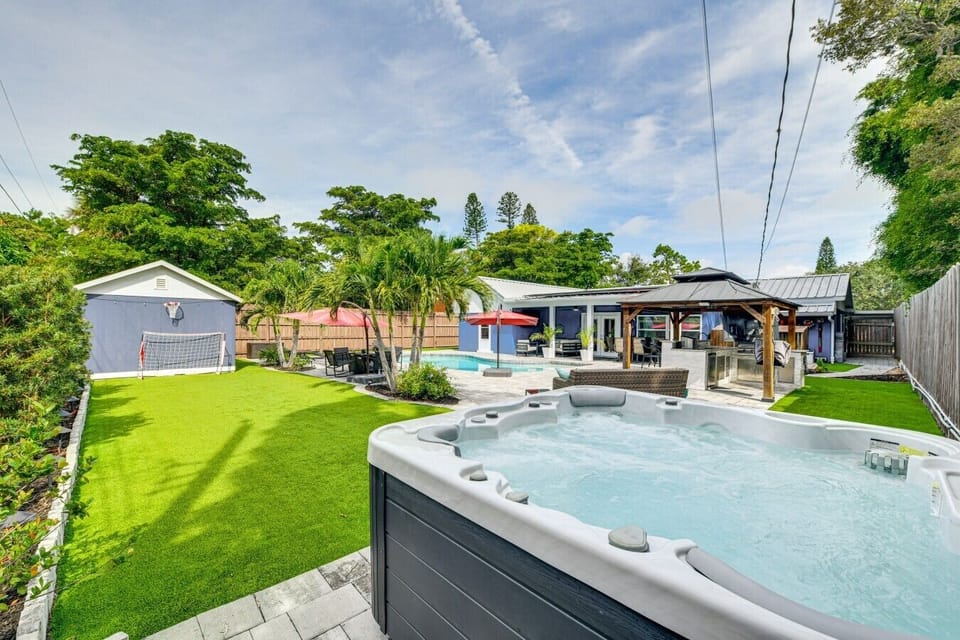 Hot Tub |  Lawn Area | Covered Patio & Palm Trees