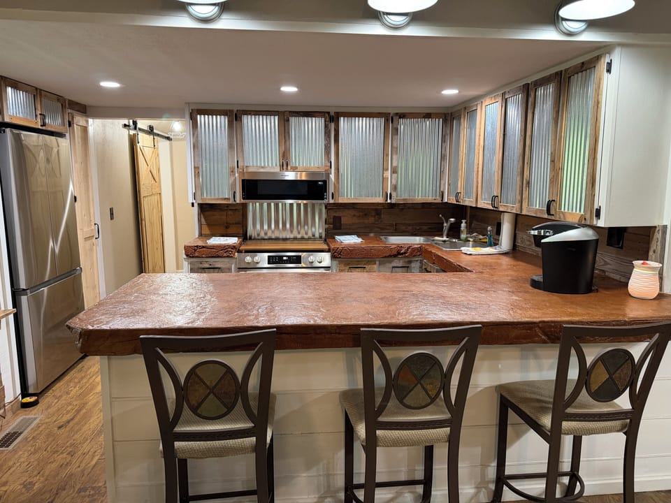 3 bar stools to eat at kitchen counter.