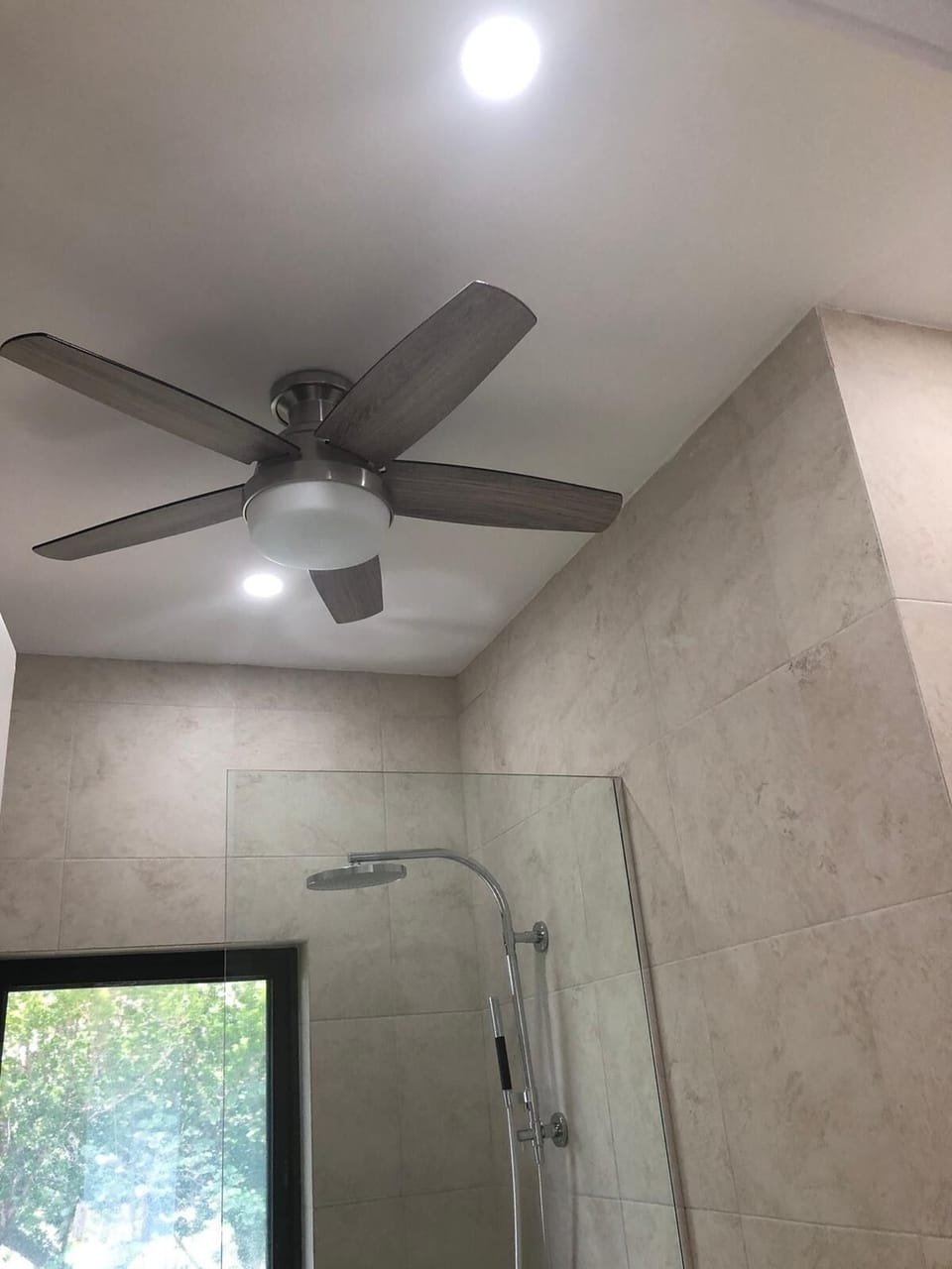 Ceiling fan for cool air in bathroom