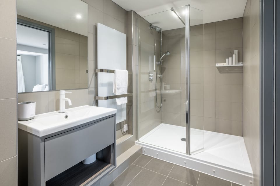 Ground floor: En-suite shower room, with large walk-in shower