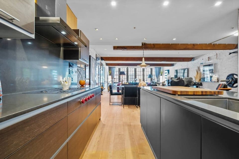 Modern kitchen with premium finishes, spacious counters, and an open layout for gathering.