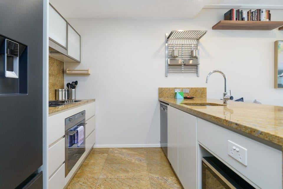 Cook up your favourite meals in the fully equipped kitchen, offering plenty of bench space and everything you need for a comfortable stay.