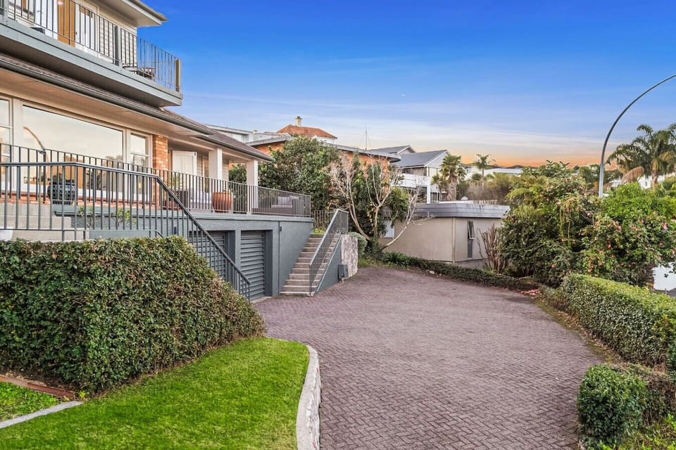 Park your car worry-free in your private driveway, then stroll through manicured gardens to your lakeside retreat.