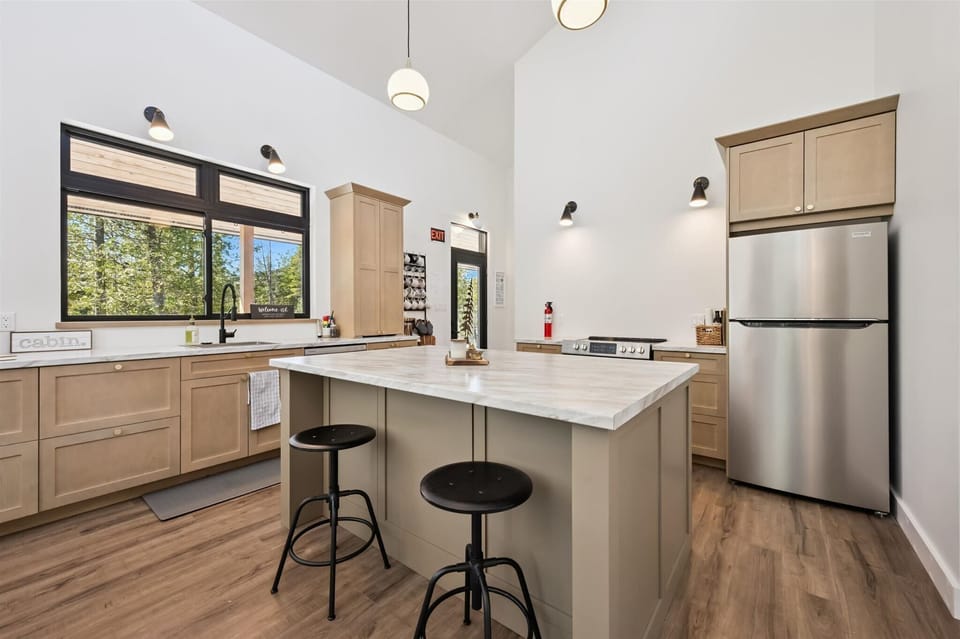 Fully equipped kitchen with a large island perfect for cooking and chatting.