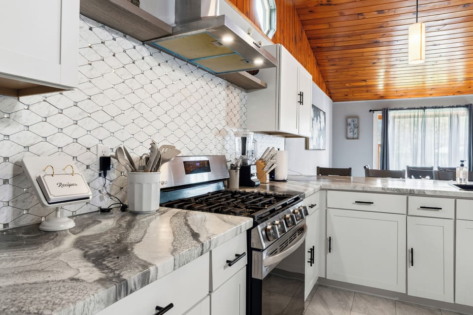 Stainless steel appliances and generous counter space make meal prep a breeze.