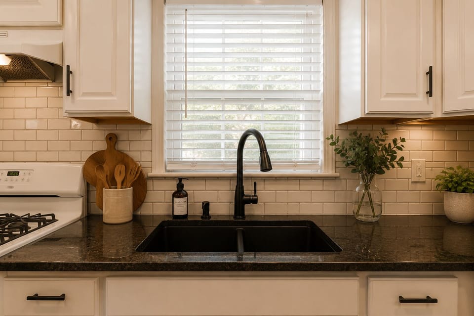 Elegant details and natural light enhance this kitchen space.