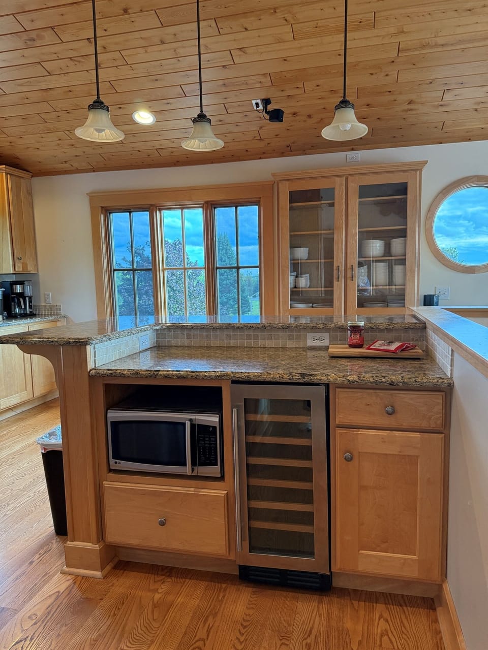 The island seats 3-4 people and also has the microwave, a beverage refrigerator. You will find a blender and toaster in the bottom cabinet.