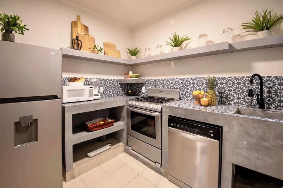 With generous counter space, quality appliances, and everything you'll need during your visit, the kitchen combines practicality with contemporary design to make every stay feel comfortably at home.