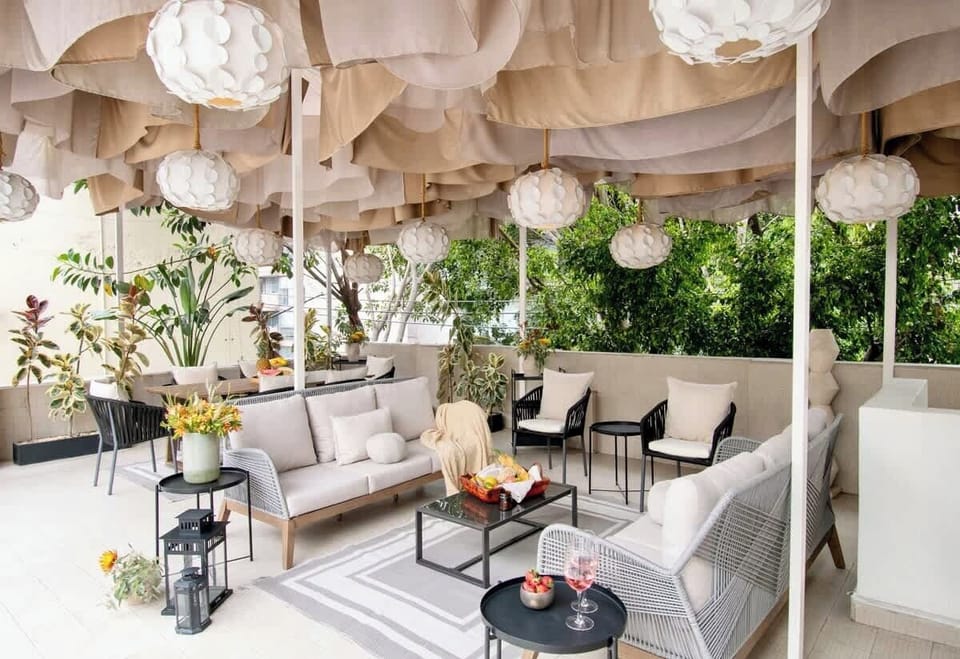 An elevated outdoor living room where comfort meets style. The perfect place to unwind, reconnect, and enjoy Mexico City's incredible weather.