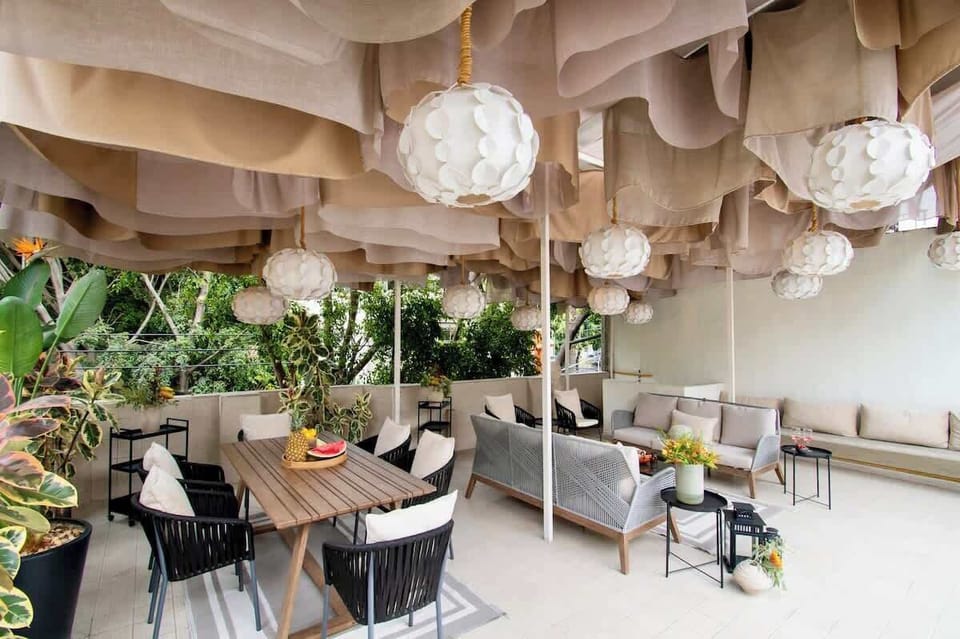 One of Soul's signature spaces: a beautifully designed rooftop where dining, lounging, and socializing flow naturally throughout the day.