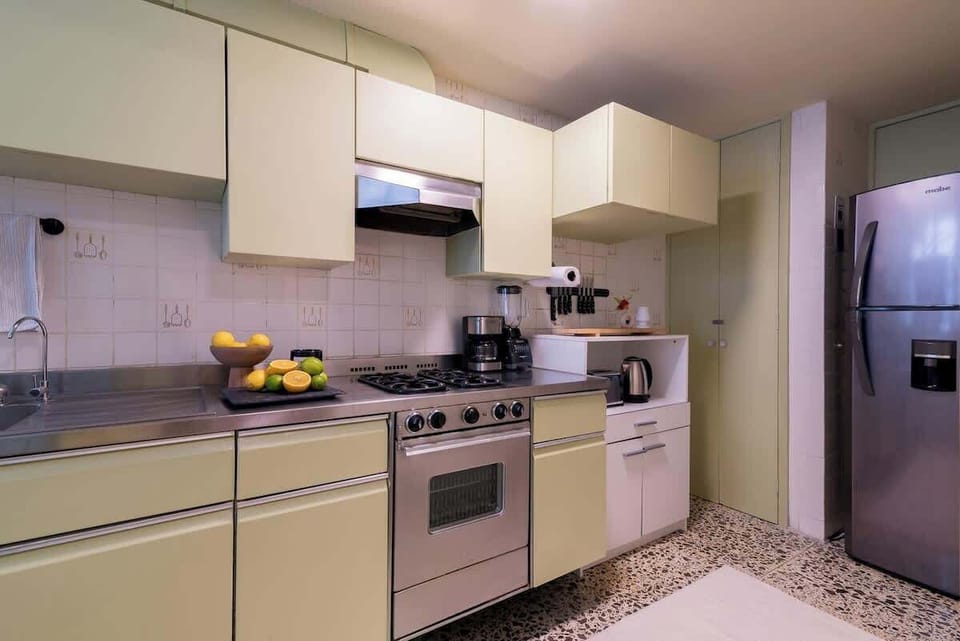 Experience the delight of culinary creations in our fully equipped kitchen, complete with essential supplies like coffee, oil, salt, pepper, and tea. Unleash your inner chef and savor every moment of preparing delicious meals with ease. 
